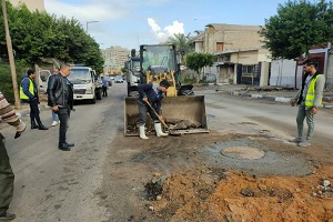 إصلاح بالوعة صرف صحي بشارع محسن الفيومي