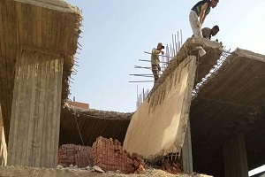 إزالة عقار متعدى على خط التنظيم بشارع مؤسسة الزكاة بالمرج الشرقى