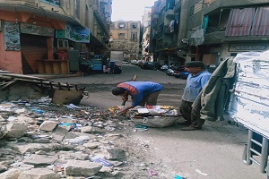أعمال نظافة بحواري الدرب الأحمر