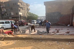 اعمال رصف بشارع  ٦ اكتوبر