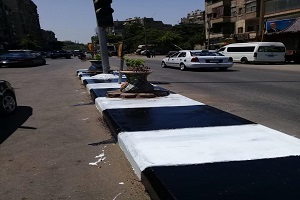 دهان الأرصفة بشوارع الحي
