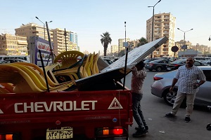 حملة لرفع الاشغالات بشارع جسر السويس