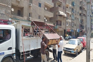 رفع الإشغالات وازالة الإعلانات المخالفة بشارعي العشرين والأربعيين