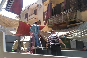 رفع الاشغالات بالحي 