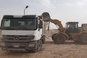 أعمال رفع للمخلفات خلف سوق النيل