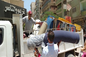 رفع الإشغالات ببعض شوارع حي السلام أول