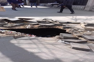 إصلاح هبوط أرضي أمام كلية آداب عين شمس