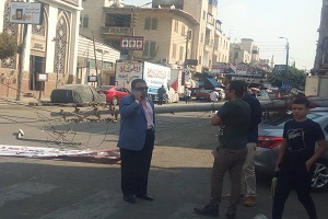 رفع اعمدة الانارة ومحاصرة النيران امام مدرسة القومية رشيد