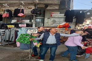 حملة لرفع الإشغالات من شوارع الحي