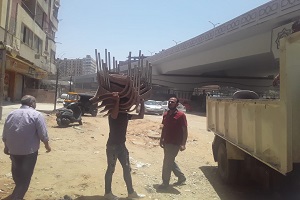 حملة لرفع الاشغالات ببعض شوارع الحي