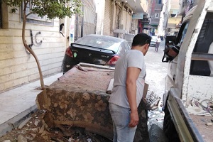 حملة لرفع الإشغالات والباعه الجائلين من شارع العشرين