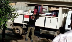 حملة لرفع الإشغالات ببعض الشوارع بالحي