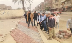 متابعة تنفيذ خطة الرصف والتطوير بنطاق الحى 