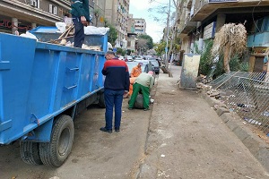 أعمال نظافة بالدرب الأحمر