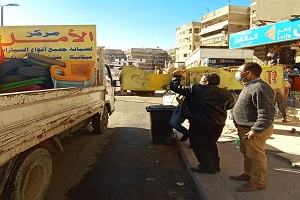 حملة لرفع إشغالات المحلات وعربة مشروبات بشارع الطاقة