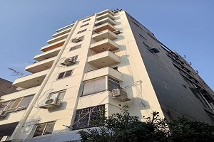 إنتهاء دهان وجهات العمارات بشارع 26 يوليو
